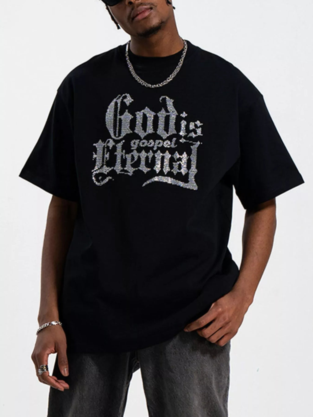 Men's black short sleeve round neck t-shirt with lettering on the front.