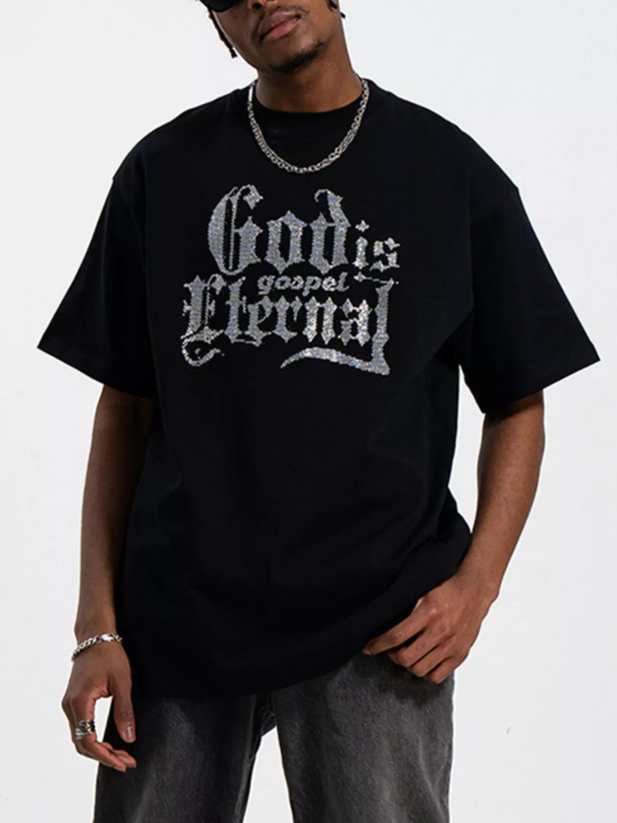 Men's black short sleeve round neck t-shirt with lettering on the front.