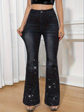 Black flare leg jeans embellished with rhinestones down the leg.