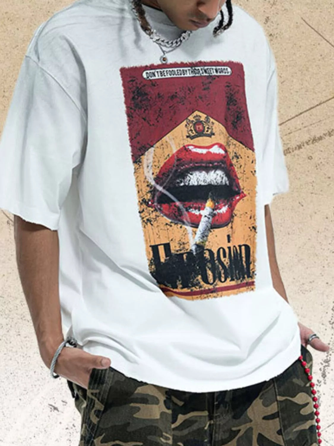 Men's half sleeve round neck t-shirt with a front graphic print.