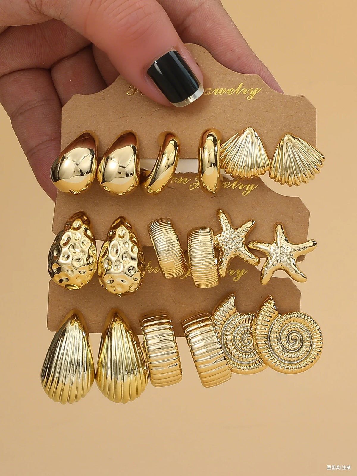 Set of gold-tone starfish, seashell and water-drop earrings