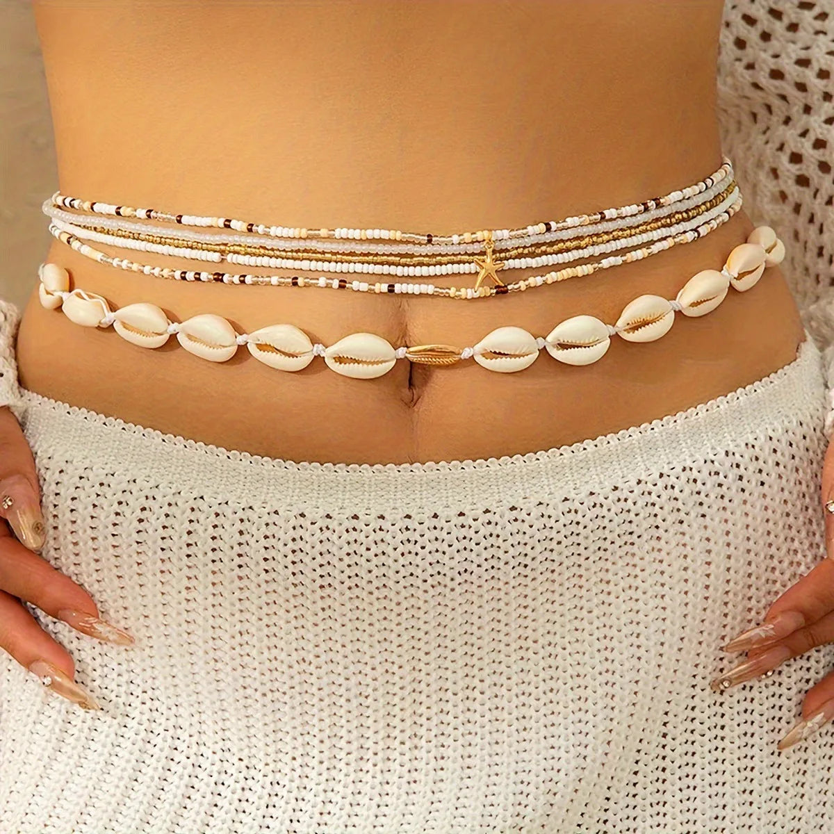 Set of six seed-bead elastic waist chains with starfish pendants, in different colours.