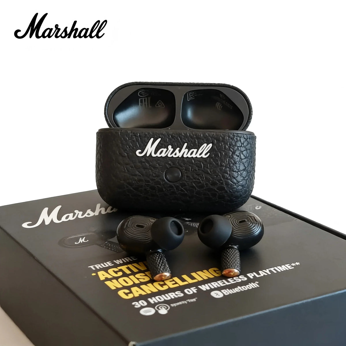 Wireless noise cancelling earphones in black and gold